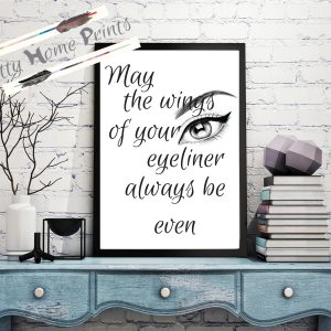 May the wings of your eyeliner always be even quote over graphic female eye design in black